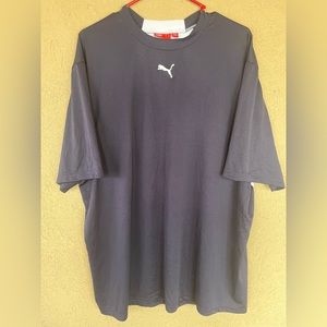 Blue and white lightweight short sleeve puma shirt. Size is an XL.